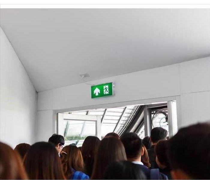 People escape to exit door